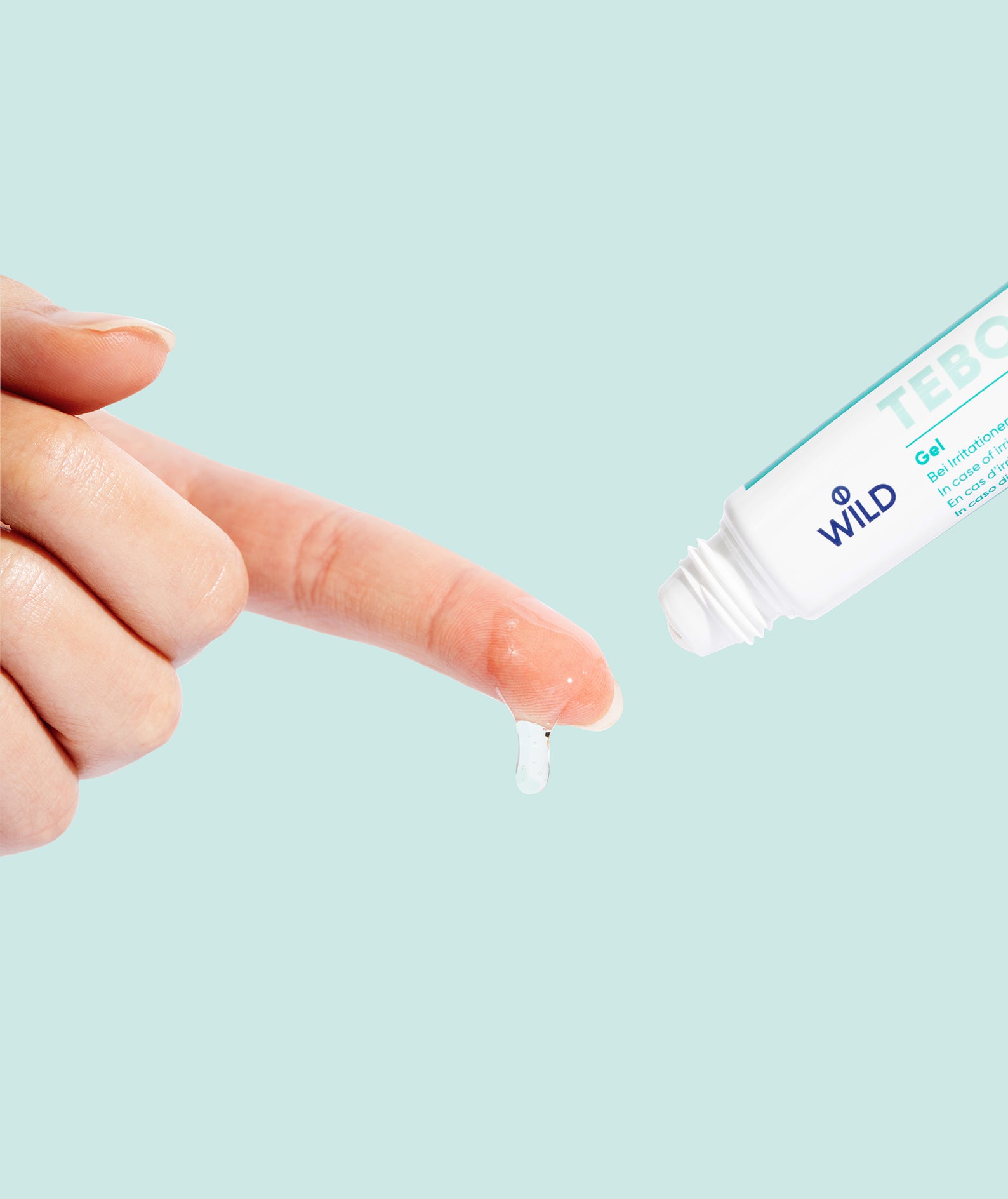 Close-up of DR. Wild TEBODONT Gel being applied to gum area