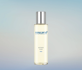 Nescens Activator Toner spray bottle with mist in motion