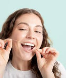 Spool of DR. Wild TEBODONT-F Stretch Floss with tea tree oil for enhanced cleaning