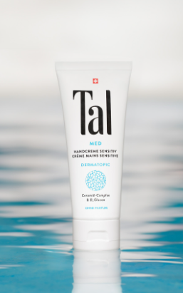TAL Med Dermatopic Handcreme applying to hands with dry or itchy skin texture