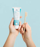 Tube of DR. Wild Emoform Sensitive Toothpaste with mineral salt formula and fluoride protection