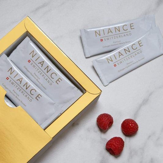 Collagen-Hyaluron Beauty Booster sachet — powder in glass with water